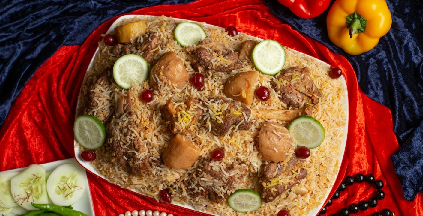 a platter of food on a red cloth