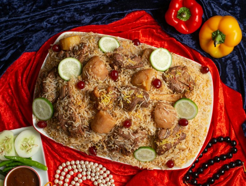 a platter of food on a red cloth